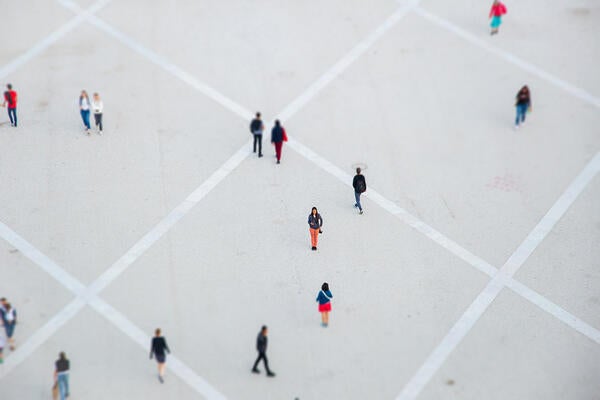 People walking in a plaza, photo by Ryutaro Tsukata