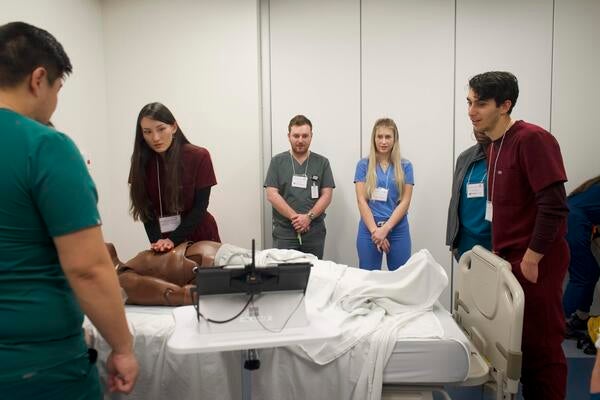 Students practice running codes at the 2023 Primary Care Summit