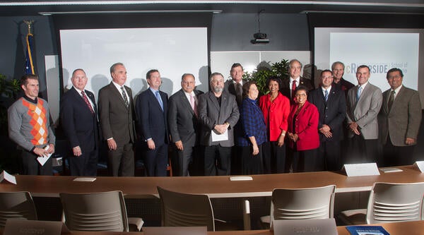 Elected officials in the G650 classroom during the grand reopening