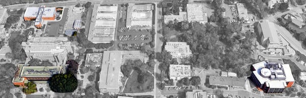 A satellite view of the east side of campus in black and white with the School of Medicine buildings in color.