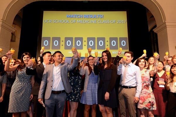 The class of 2017 toasts at their Match Day at the Mission Inn.