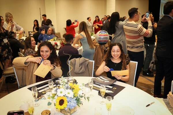 Students open their envelopes on Match Day 2023