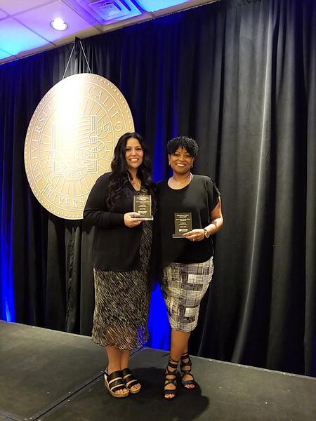 Teresa Luther and Kathy Buckner receive their 2023 award.