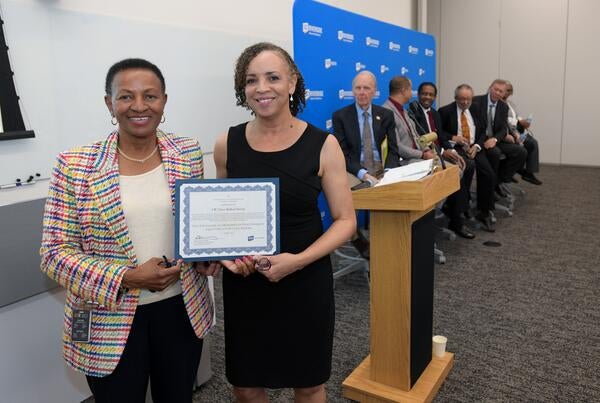 Deas and Harris with certificate