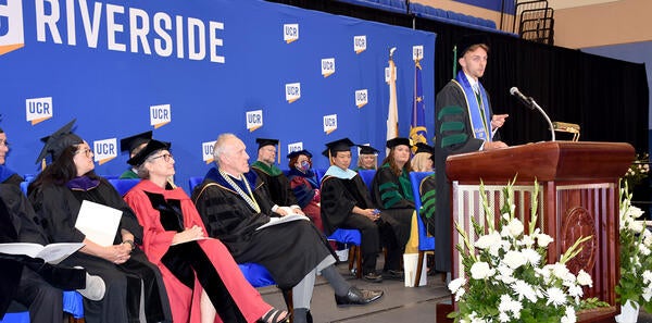 Brandon Barger speaking at commencement