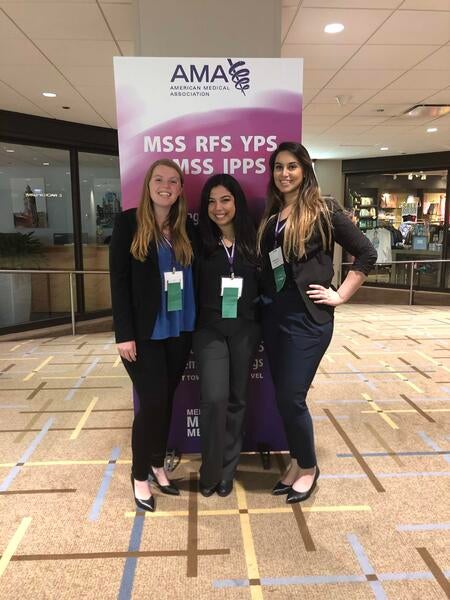 Julia Seiberling and two others at an AMA conference