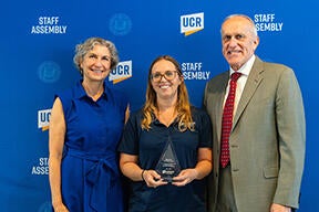 Kate Dorff with Provost Liz Watkins and Chancellor Kim Wilcox