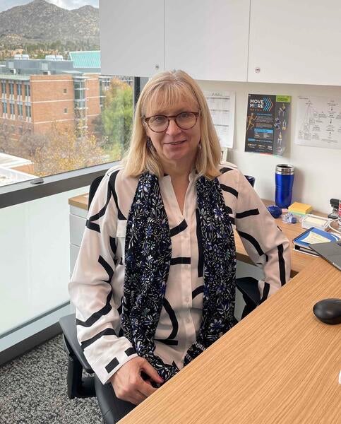 Iryna Ethell at her desk