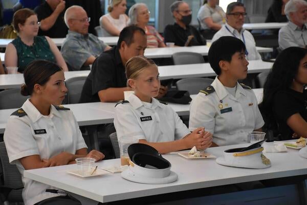 West Point cadets sitting at a table at UCR