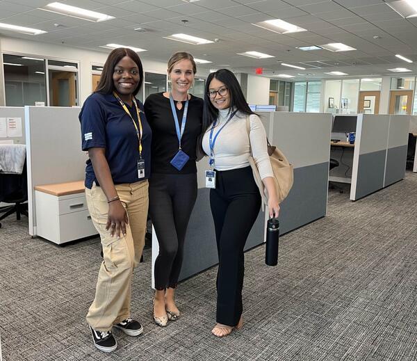 Arpy Barsemian and two other administrative fellows in the office