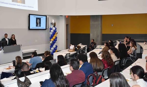 LMSA conference attendees sitting in a room