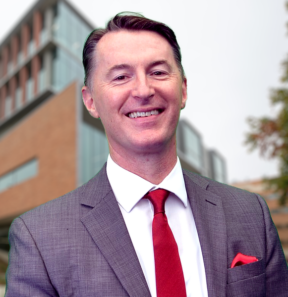 Declan McCole in front of the SOM ed 2 building