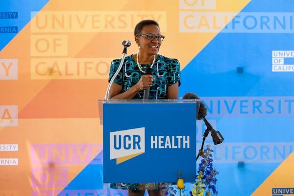 VC and Dean Deborah Deas speaking in front of a crowd