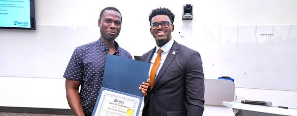 Isaac Owusu-Frimpong and Vladimir Oge