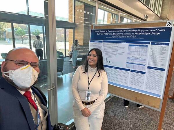Dr. Novak and Leilani Tull with her research poster