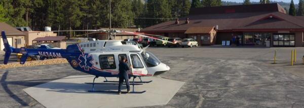A helicopter in front of the clinic