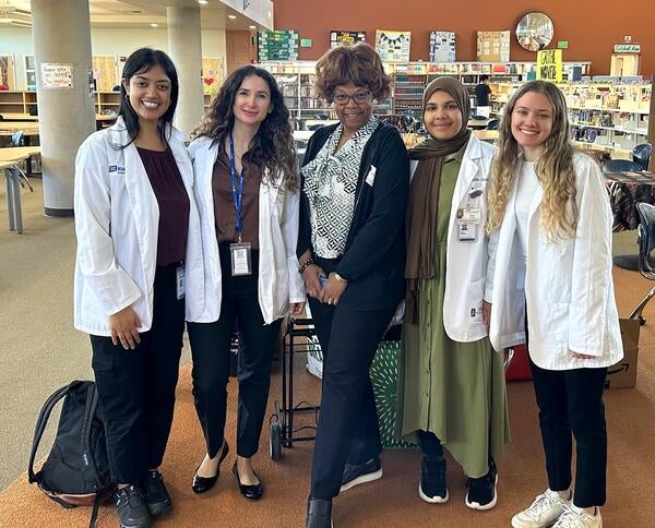 Dr. Reedus with medical students