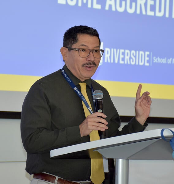 Dr. Pablo Joo speaking at the celebration