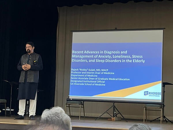 Rajesh "Robby" Gulati presenting at an event