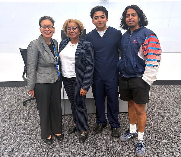 Lisa Fortuna, Tami Benton, and two UCR SOM Medical students
