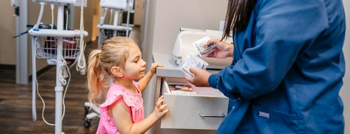 Child working with a doctor