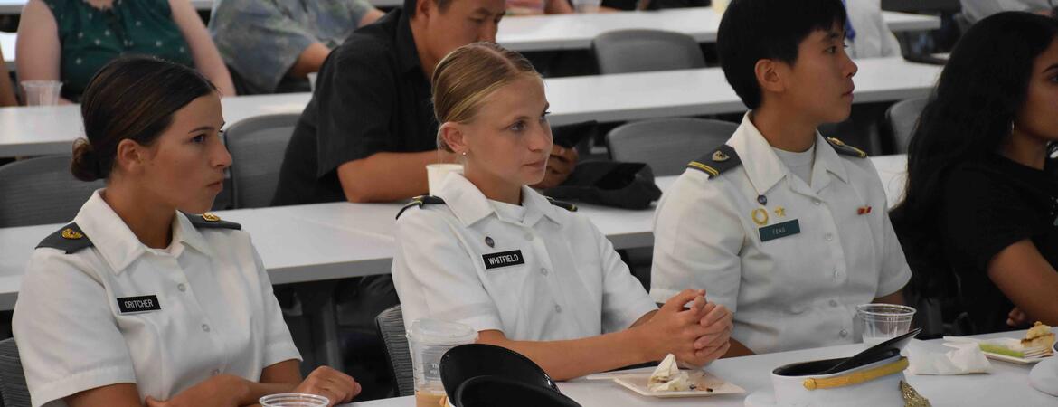 West Point cadets sitting at a table at UCR