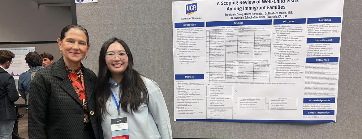 Stephanie Zheng standing in front of a research poster