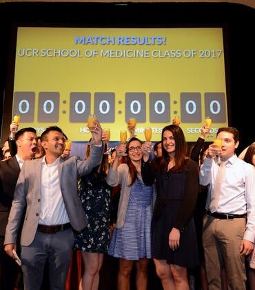 The class of 2017 toasts at their Match Day at the Mission Inn.