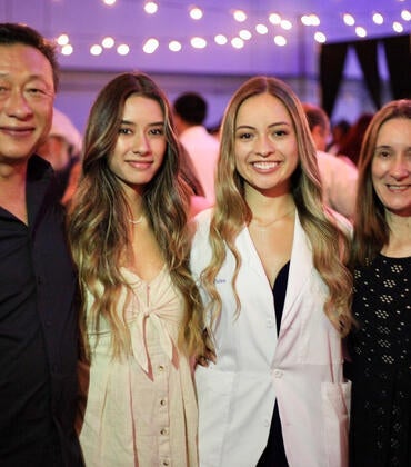 Aislyn Oulee and her family at the White Coat Ceremony in 2019.