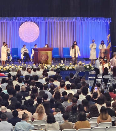 stage at the 2023 White Coat ceremony