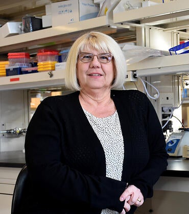 Coss in her lab