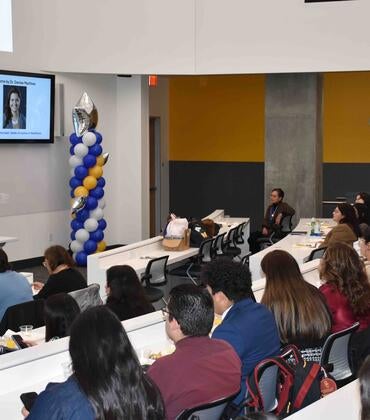 LMSA conference attendees sitting in a room