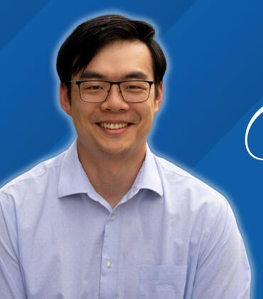 Headshot of Andrew Huang on a blue background next to text reading "Class of 2026"