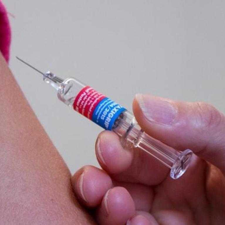 Closeup of someone receiving a vaccination