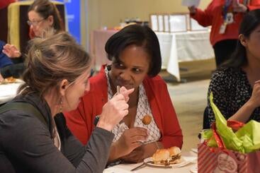 Cofield-profile-2 Teresa Cofield sitting at a table at an event
