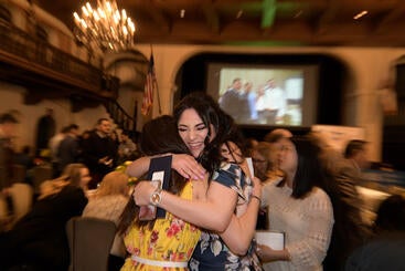 at_hugs Alejandra Torres hugs Rita Lis at the 2019 match day