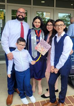 Gonzalez with her husband and children at her graduation ceremony in Washington, DC
