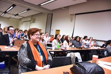 Dr. Carson sitting in a classroom