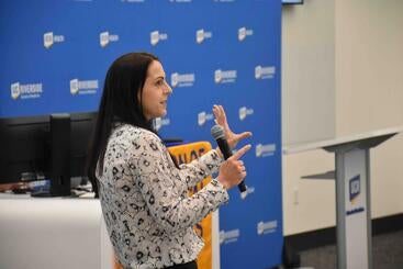 keynote-dauphine-biomed50.jpg Dr. Dauphine presenting at the biomed 50th symposium