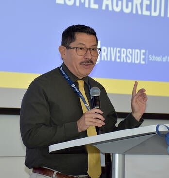 Dr. Pablo Joo speaking at the celebration