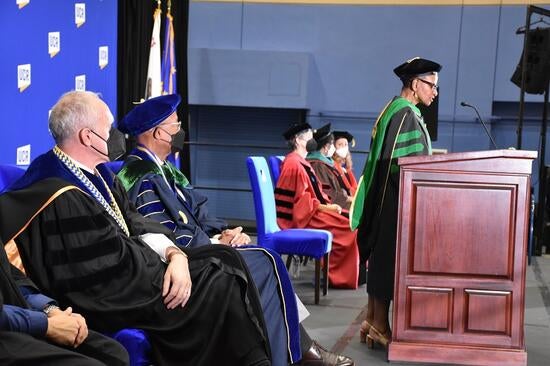 VC and Dean Deborah Deas speaks as Chancellor Kim Wilcox and President Michael Drake look on